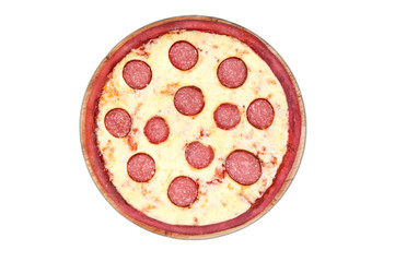 Red pizza on a round wooden plate with lots of cheese and smoked sausage