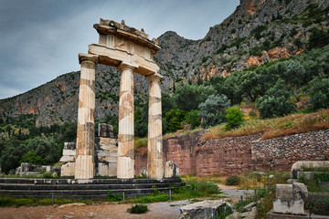 Tholos with Doric columns at the sanctuary of Athena Pronoia temple ruins in ancient Delphi, Greece
