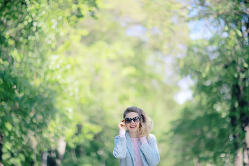 summer photo adult girl / beautiful blonde on summer photo, concept of summer female happiness