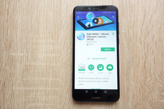 KONSKIE, POLAND - JUNE 17, 2018: Enjin Wallet - Bitcoin, Ethereum, Litecoin, ERC20 app on Google Play Store website displayed on Huawei Y6 2018 smartphone