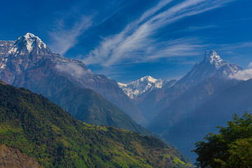 Mount Machhapuchhre or Fishtail in the Himalayas in Nepal. We can see the peak of Machhapuchhre along the way  between the walking path to the Annapurna Base Camp.