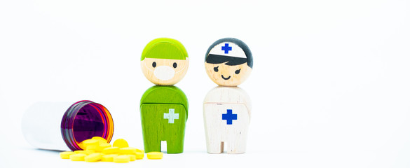 avigan 200 or favipiravir or t-705 medicine to stop outbreak Coronavirus COVID-19.Doctor and Nurse with avigan 200 on white background.Medicine fight and stop to Pandemic coronavirus covid19 symptom.