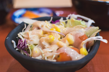 Vegatable salad with tomato corn cabbage and lettuce