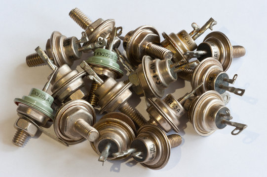 Old thyristors on a white background.