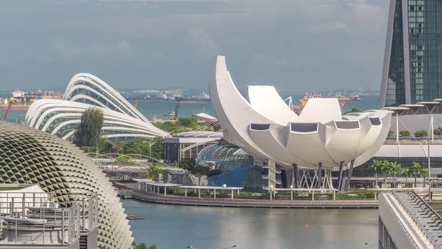 Art Science Museum In Bayfront aerial timelapse, Singapore. Ships on a background, ArtScience Museum is a museum located within the integrated resort of Marina Bay Sands