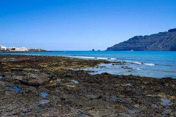 Fototapeta na wymiar Volcanic rocks coastline in caleta de sebo, la graciosa canary islands