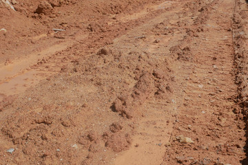 The mark of heavy vehicle tires that have gone through a soft ground area.