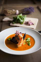 bouillabaisse seafood soup with shrimps salmon and mussels - obrazy, fototapety, plakaty