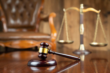 Lawyers office concept. Law symbols composition: scale and gavel.