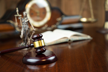 Lawyers office concept. Law symbols composition: gavel, scale and Themis statue