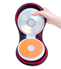 Bag case with CD discs in hand on white background isolation