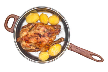 Fried chicken and potatoes on pan isolated on white background