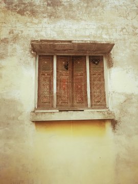 old window on a wall
