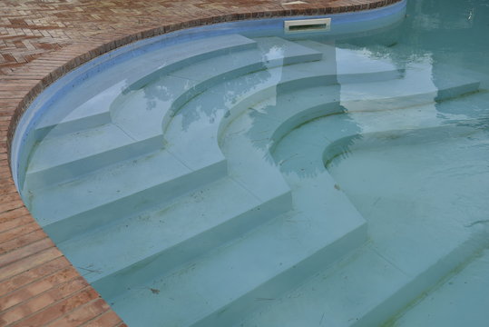 Stairs in the Pool Water