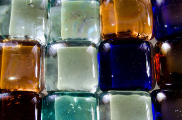 Glass tile multicolored with highlights from the light source