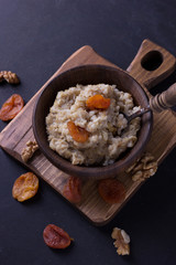 Oatmeal on a dark background