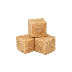 Close up brown sugar cubes isolated on white