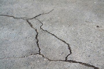 Large cracks in the asphalt