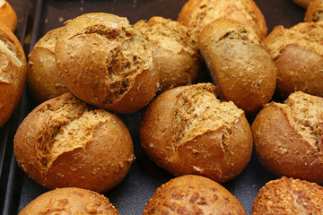 Close up fresh bread buns on retail display