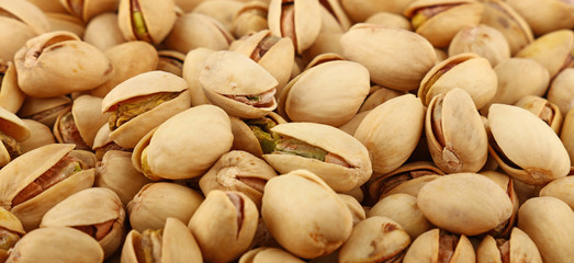 Background of fresh roasted pistachio nuts