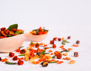 Super Food. Berry fruit drink In a wooden spoon on a white background. . Recovery after illness,...