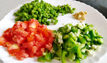 Fresh chopped vegetables on a white plate