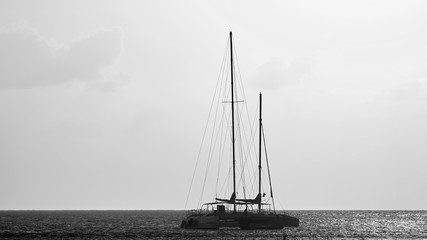 Yachts in the Bay. Silhouettes of yachts at sunset.