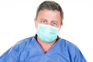 Portrait of male nurse man wearing medical mask blue white background protective health Coronavirus concept covid-19