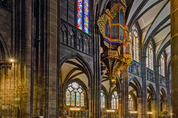 Naklejka premium The great organ in swallow's nest in the cathedral of Strasbourg, France