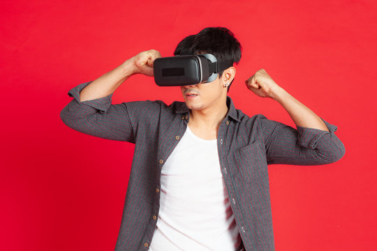 Young Man Wearing VR Headset