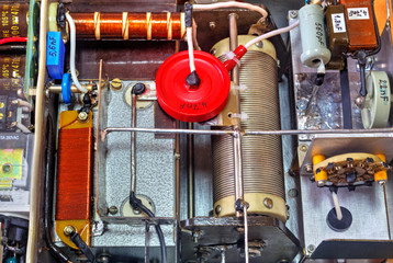 Inside view of high frequency power amplifier with capacitors, coils and other components