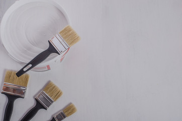 A set of brushes and paint for repair in an apartment, a house. Preparation for repair, for advertising construction