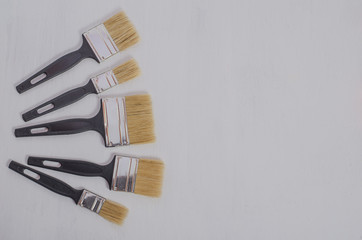 A set of brushes for painting walls for repair in an apartment, a house. Preparation for repair, for advertising construction
