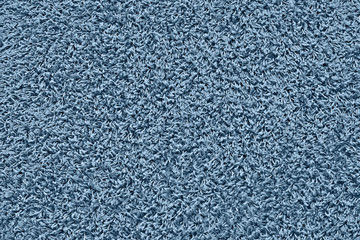 Carpet texture, classic blue color background. Floor. Backdrop.