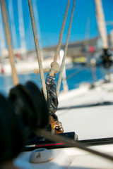 Yacht. Blocks for rope on a yacht. Fenders.
