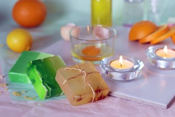 Fototapeta na wymiar Soap, burning candles, ingredients for mask and body care, home relaxation, spa, hygiene, natural cosmetics, healthy lifestyle