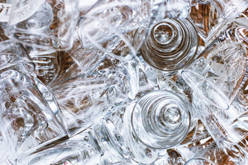 Vodka glass in group. Catering company banquet alcohol table. Pile of vodka shots. Restaurant bar serving liquor background. Crystal glass food and drink industry texture.