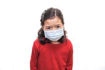 Asian young kid wearing a surgical mask