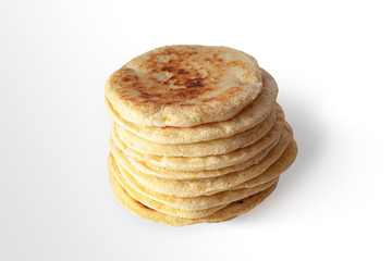 homemade moroccan bread on the table isolated on a white background. Traditional Moroccan bread. A closeup of moroccan bread.
