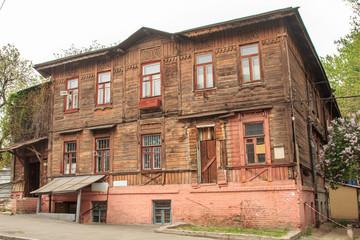 Old wooden house in summer on a sunny day