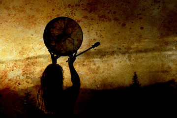 beautiful shamanic girl playing on shaman frame drum in the nature, old photo effect.