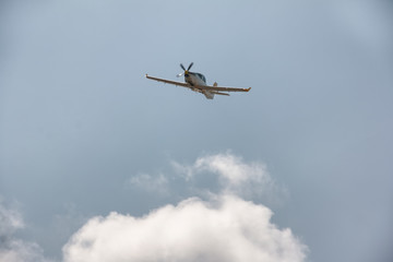Display of a flying plane in the beautiful blue sky