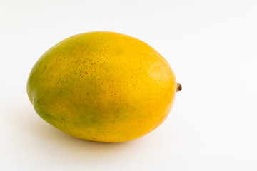 Closeup of a mango fruit isolated on a white background