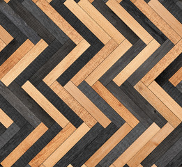 Wood texture background. Seamless wooden floor with herringbone pattern made of thin planks.