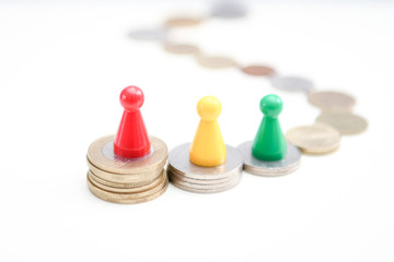 colorful figures standing on podium of coins 1, 2, 3 place. Financial concept