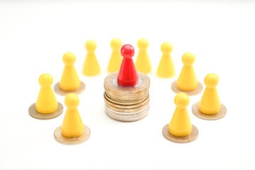 Successful Financial Winner. Leader Figure standing on stack of coins