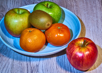Fruits on plate and table