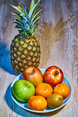 Fruits on plate and table