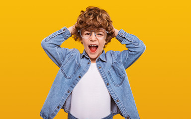 Stylish boy screaming in excitement © kegfire