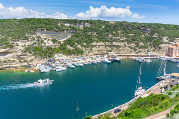 Fototapeta na wymiar View from above of Bonifacio port and church of St. John the Baptist in Bastia, in Corsica, France.
